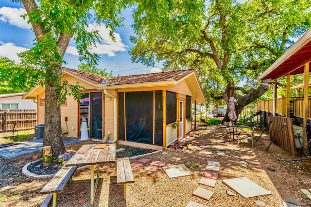 1307 Wright St, Llano, TX 78643 - rear view of house with a patio