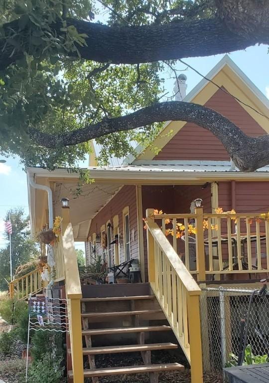 1307 Wright St, Llano, TX 78643 - back of house with stairway and covered porch