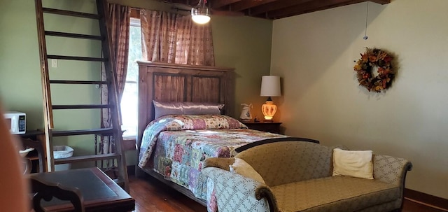 bedroom featuring dark wood-type flooring