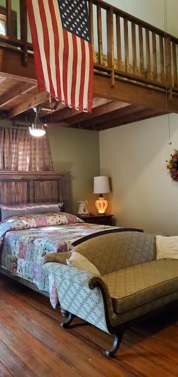 bedroom featuring hardwood / wood-style floors