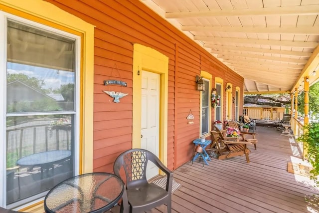 wooden deck featuring a porch