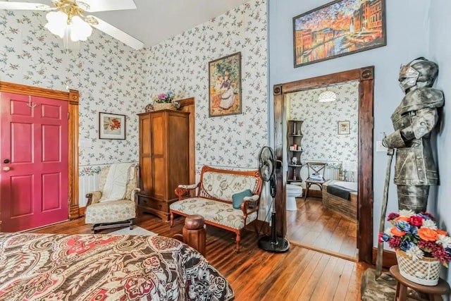 sitting room with hardwood / wood-style flooring and ceiling fan