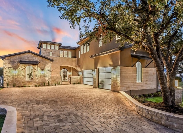 view of front of home featuring a garage