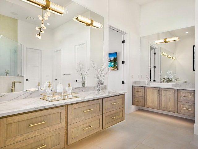 bathroom featuring vanity and a towering ceiling