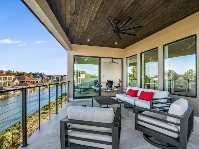 balcony with an outdoor hangout area and ceiling fan