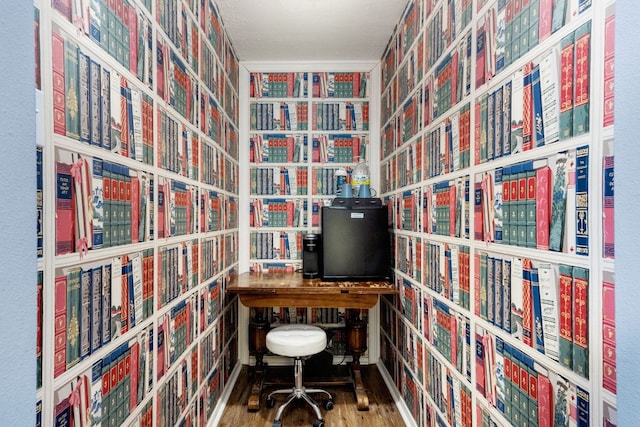 office area with hardwood / wood-style floors