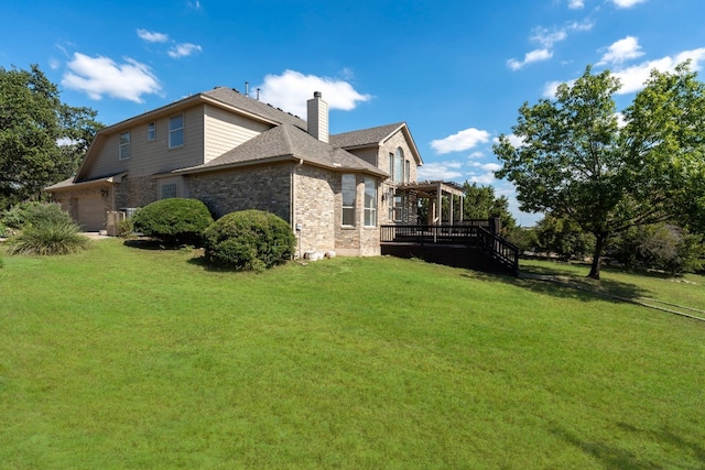 view of side of home featuring a garage, a yard, and a pergola