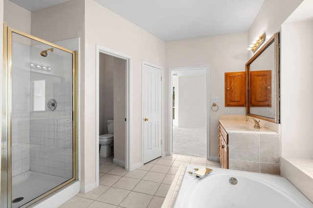 full bathroom featuring independent shower and bath, vanity, tile patterned floors, and toilet