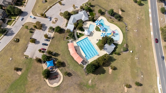 702 Timarron Dr, Leander, TX 78641 - view of property location with a pool area