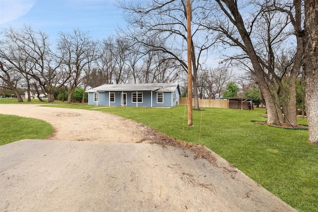 view of front of home with a front yard