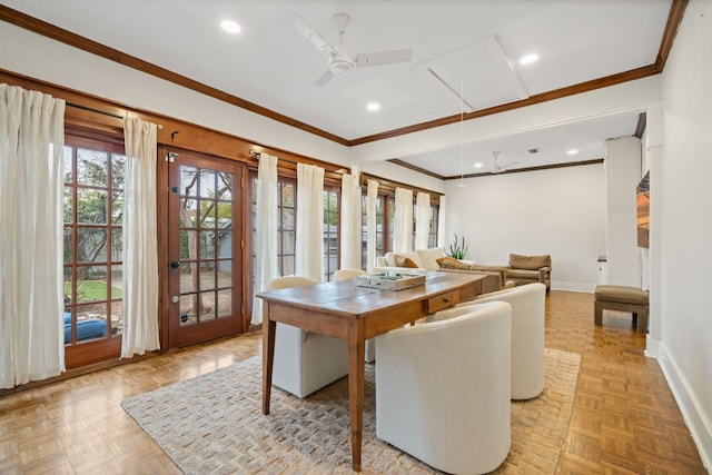 dining room featuring light parquet floors, ornamental molding, and ceiling fan