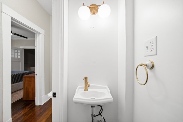 bathroom featuring sink and hardwood / wood-style floors