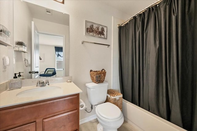 full bathroom featuring vanity, shower / bath combination with curtain, and toilet