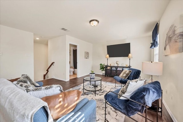 living room with hardwood / wood-style flooring