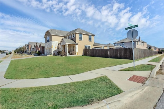 exterior space featuring a front yard