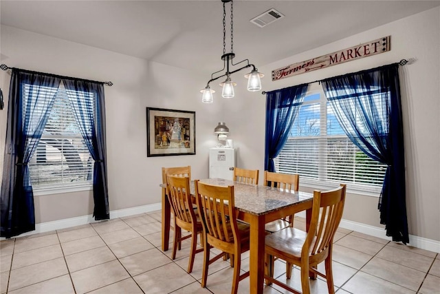 dining room featuring light tile patterned floors