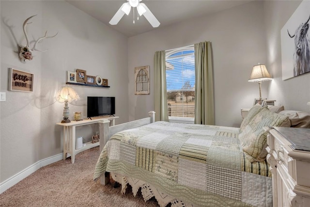 bedroom with ceiling fan and carpet flooring