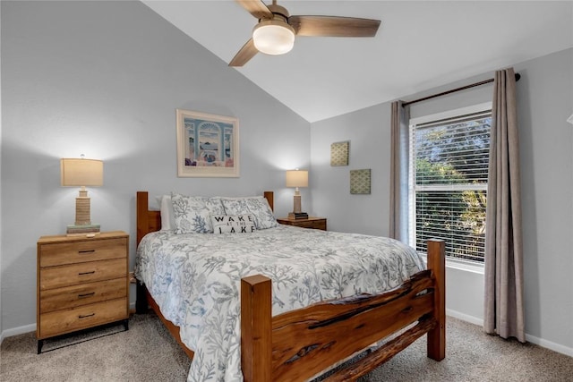 bedroom featuring light carpet, vaulted ceiling, and ceiling fan