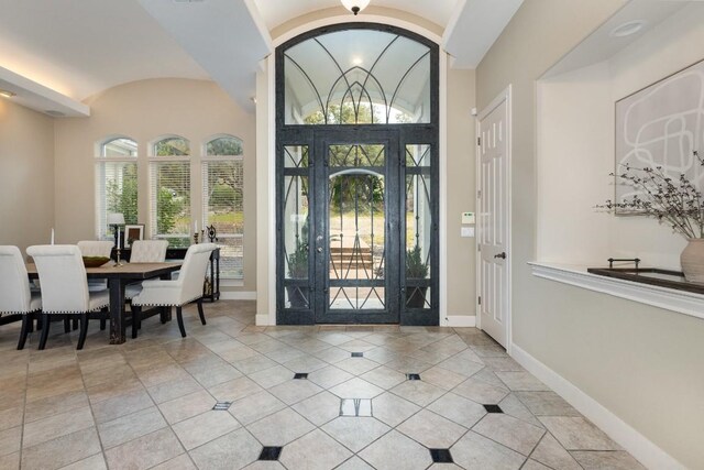 5019 Mcintyre Cir, Austin, TX 78734 - entryway featuring baseboards and light tile patterned floors