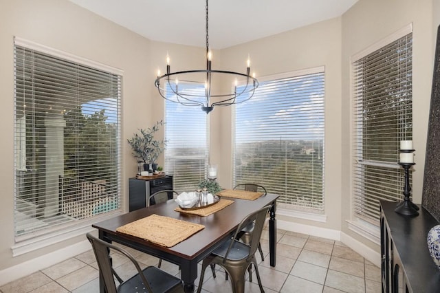 5019 Mcintyre Cir, Austin, TX 78734 - dining area featuring a chandelier and light tile patterned flooring