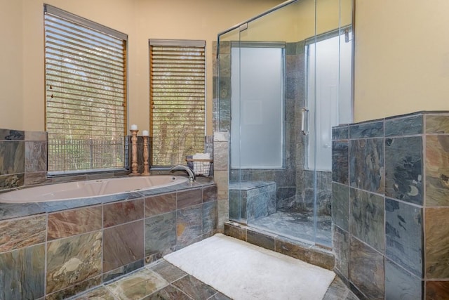 5019 Mcintyre Cir, Austin, TX 78734 - bathroom with a bath and a stall shower