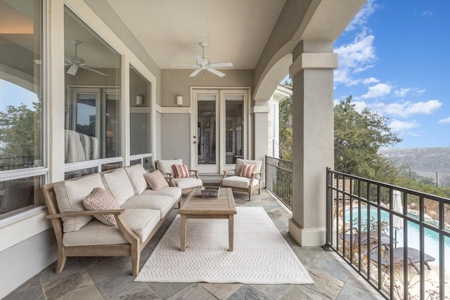 5019 Mcintyre Cir, Austin, TX 78734 - balcony with a ceiling fan, view of pool area, and an outdoor hangout area