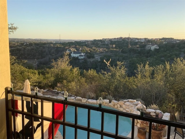 5019 Mcintyre Cir, Austin, TX 78734 - view of balcony at dusk