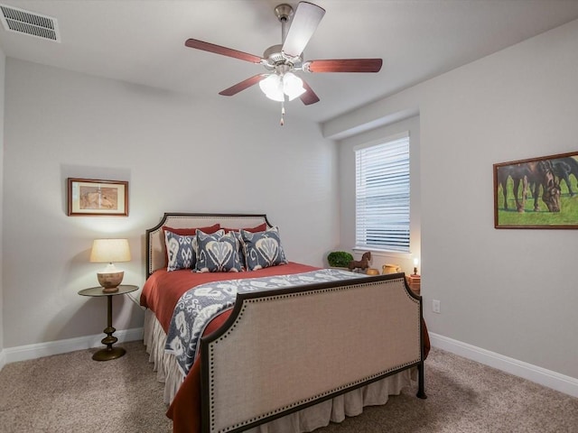 bedroom featuring baseboards, visible vents, ceiling fan, and carpet flooring