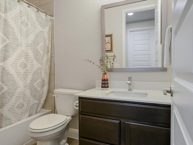 bathroom featuring shower / tub combo with curtain, vanity, and toilet