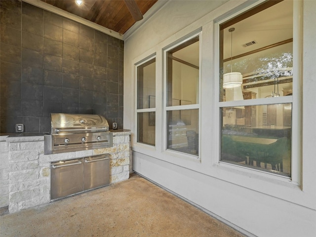 view of patio / terrace featuring area for grilling and exterior kitchen