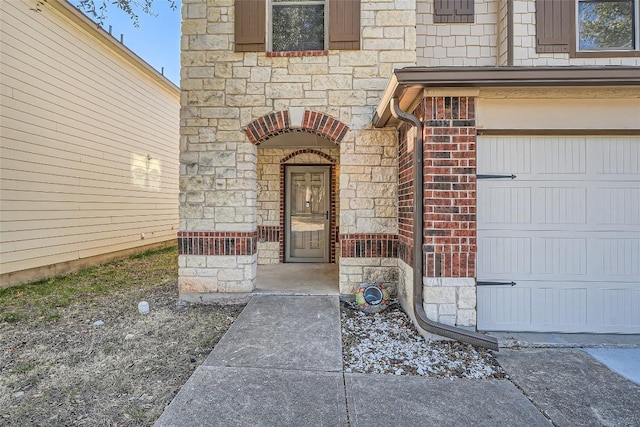 property entrance with a garage