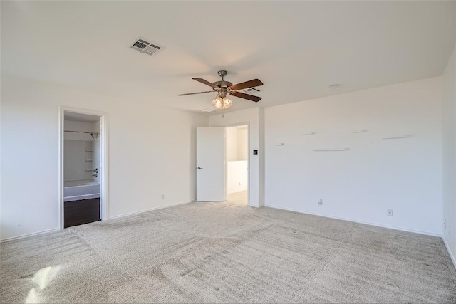 unfurnished bedroom with light carpet and ceiling fan