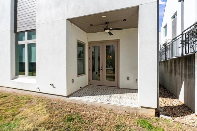 property entrance with a patio, ceiling fan, and french doors