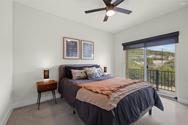 bedroom featuring access to outside and ceiling fan