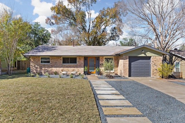 ranch-style house with a garage and a front lawn