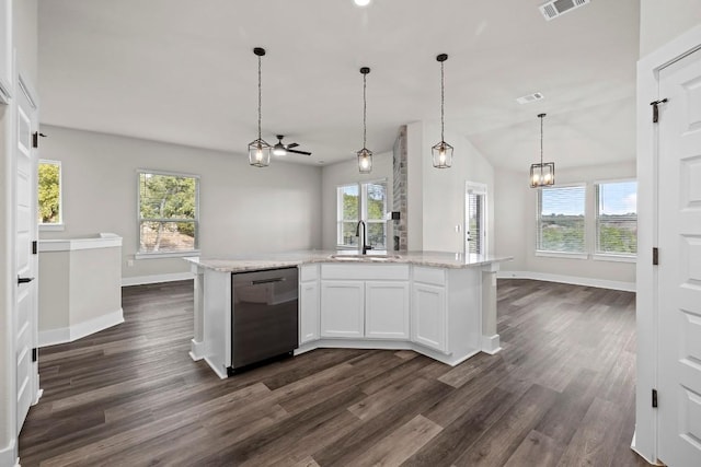 kitchen featuring sink, white cabinetry, light stone counters, dark hardwood / wood-style floors, and dishwasher