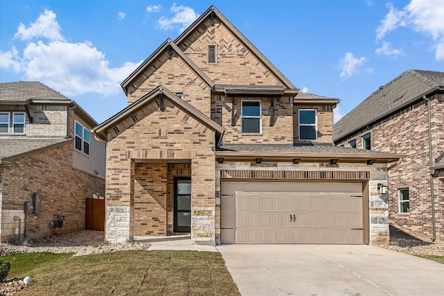 1349 S Brook Dr, Leander, TX 78641 - view of front of property with a garage, brick siding, driveway, and stone siding