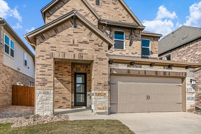1349 S Brook Dr, Leander, TX 78641 - view of front of property with brick siding, driveway, and a garage