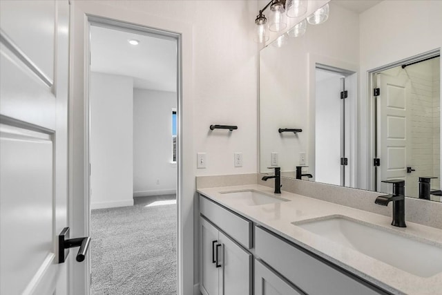 1349 S Brook Dr, Leander, TX 78641 - full bath with double vanity and baseboards