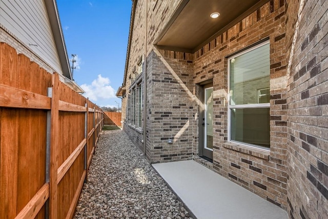 entrance to property featuring a patio