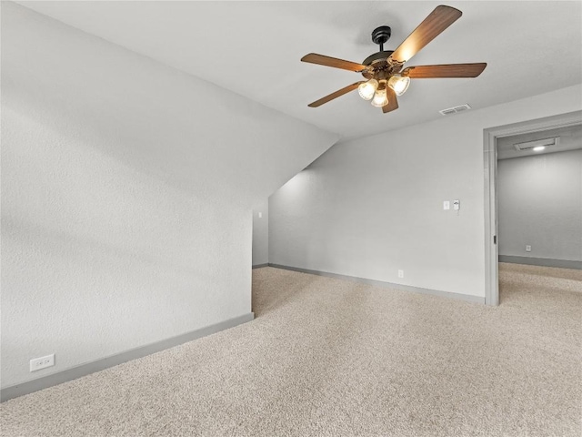 additional living space with lofted ceiling and ceiling fan