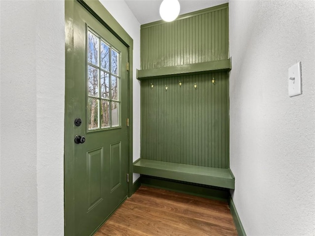 mudroom with dark hardwood / wood-style flooring