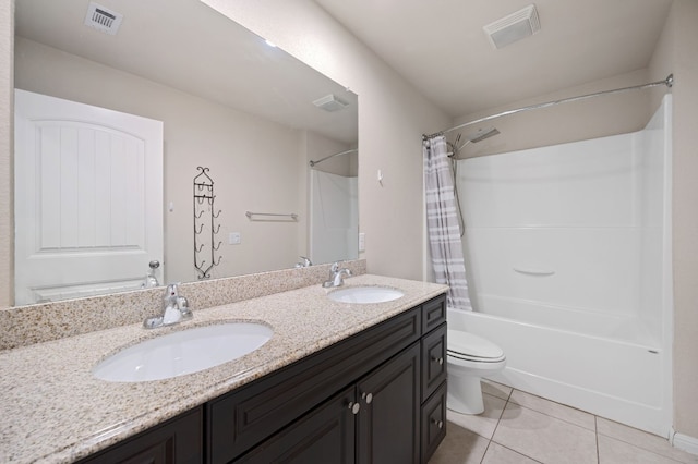 full bathroom featuring shower / tub combo with curtain, vanity, tile patterned floors, and toilet