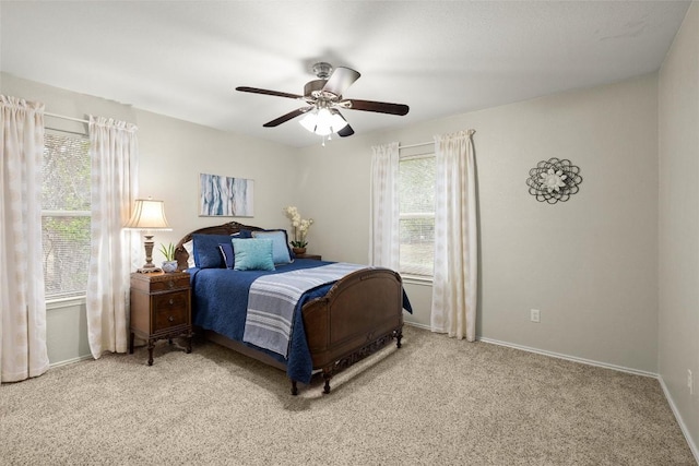 bedroom featuring ceiling fan and carpet flooring