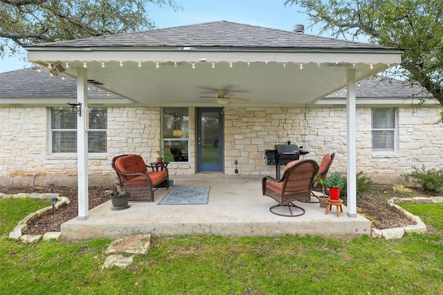 view of patio featuring ceiling fan and area for grilling