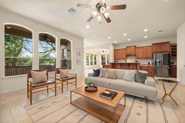 living room with ceiling fan