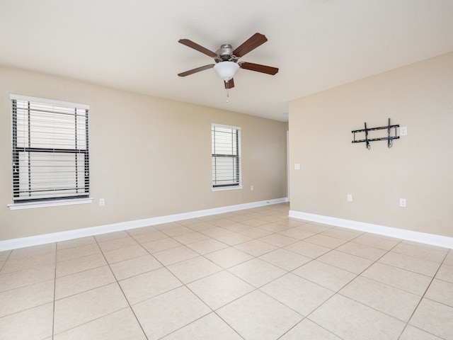 unfurnished room with ceiling fan