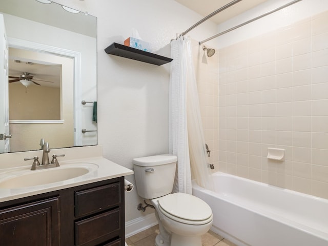 full bathroom with ceiling fan, tile patterned flooring, shower / tub combo, vanity, and toilet