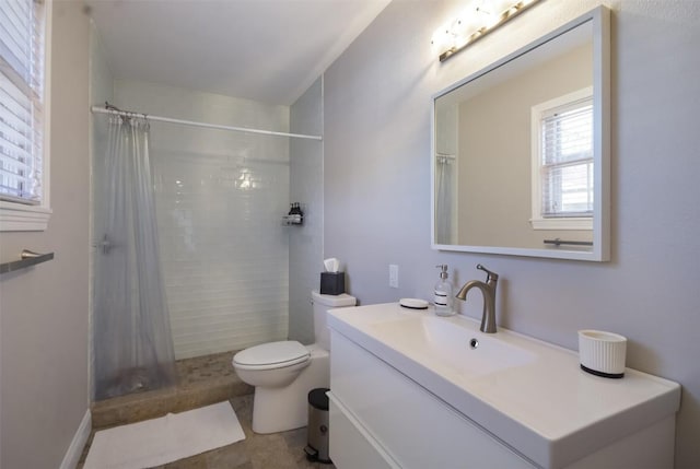 bathroom with vanity, toilet, and a shower with shower curtain