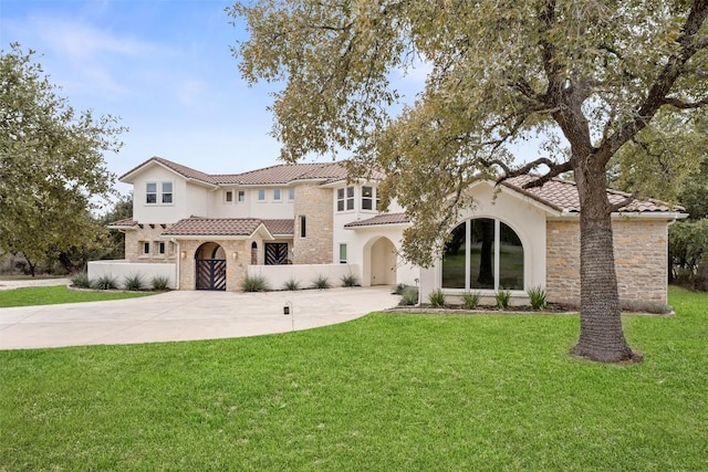 view of front facade with a garage and a front yard